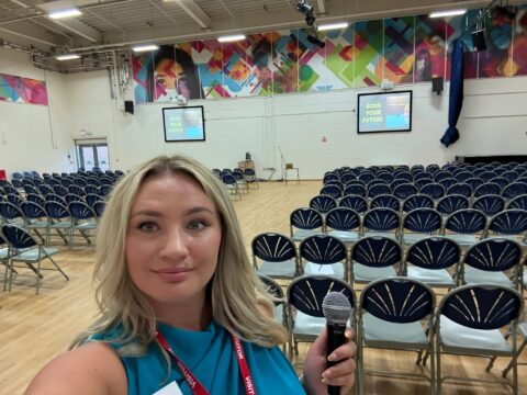 Emily Mallender preparing to deliver her Boss Your Future talk at a school