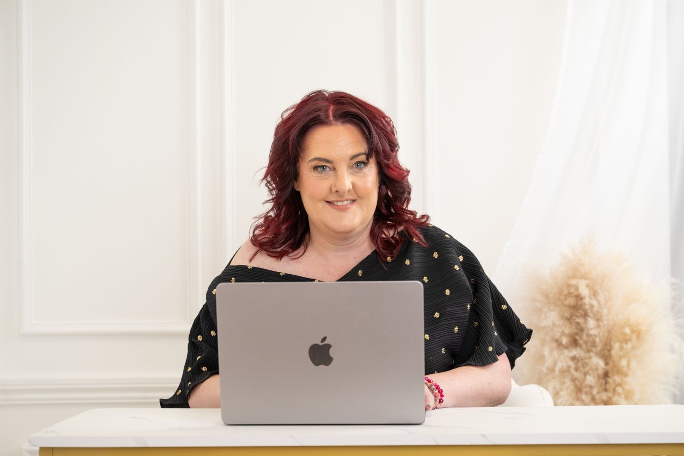 Woman business owner in her personal brand photo, shot by EMpowered Media