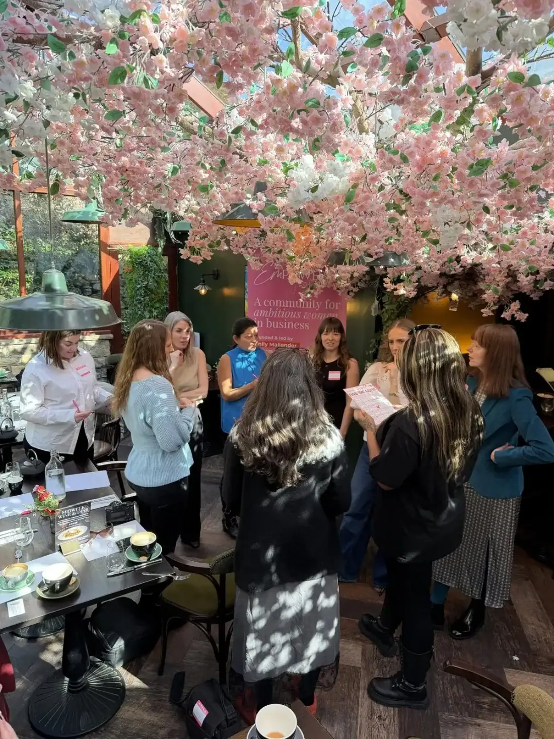 Women networking at an EMpowered event